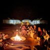 romantic dinner around camp fire