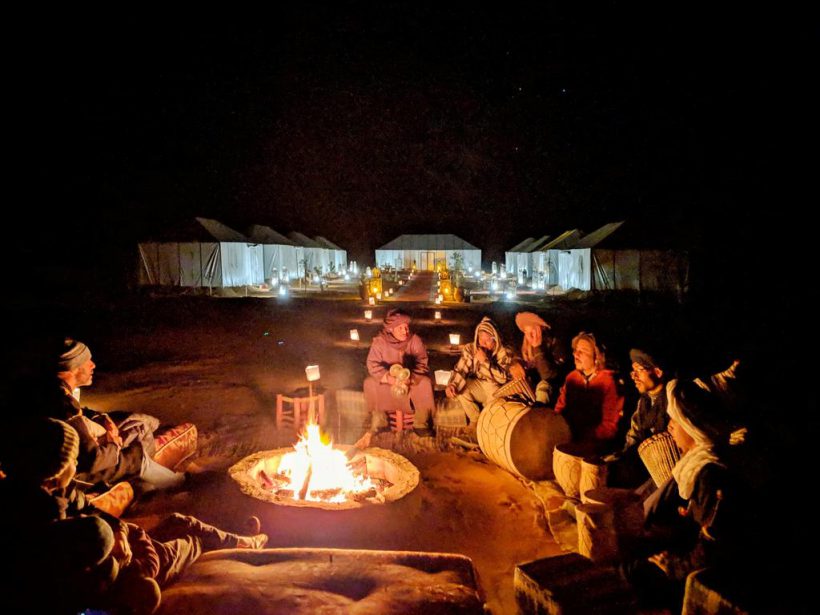 romantic dinner around camp fire